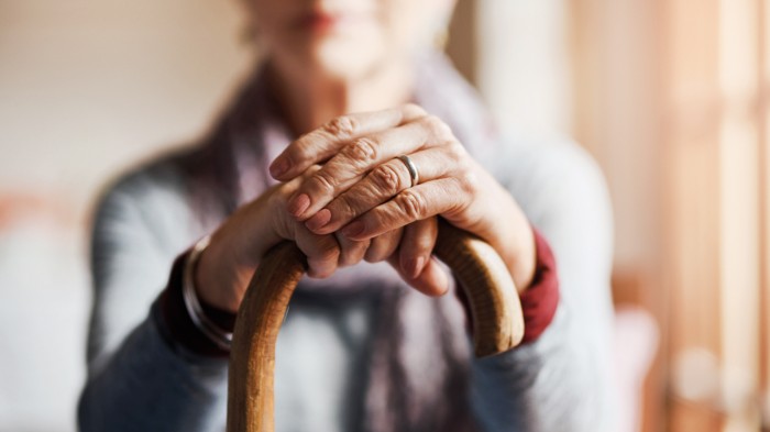 elderly woman, hands on stick copy.jpg